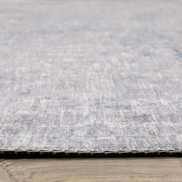 HomeRoots 5' Contemporary Grey and Blue Abstract Power Loom Area Rug - Stain Resistant, Ideal for High-Traffic Spaces 9' X 12' 509512