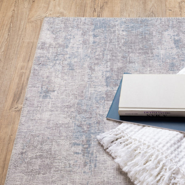 HomeRoots 5' Contemporary Grey and Blue Abstract Power Loom Area Rug - Stain Resistant, Ideal for High-Traffic Spaces 9' X 12' 509512