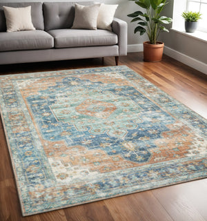 HomeRoots 5' Vibrant Oriental Area Rug in Orange, Blue, Teal, and Beige - Stain-Resistant Durability for Homes 5' X 7' 509522
