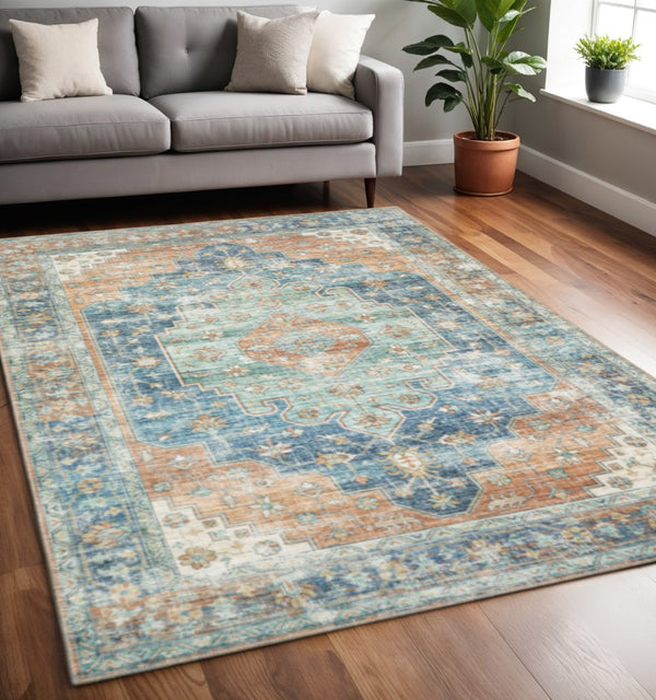 HomeRoots 5' Vibrant Oriental Area Rug in Orange, Blue, Teal, and Beige - Stain-Resistant Durability for Homes 5' X 7' 509522