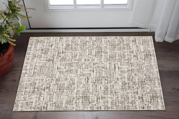 HomeRoots 2' Modern Abstract Power Loom Stain Resistant Runner Rug in Ivory, Grey, Charcoal, and Beige 3' x 5' 509542