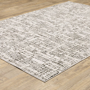 HomeRoots 2' Modern Abstract Power Loom Stain Resistant Runner Rug in Ivory, Grey, Charcoal, and Beige 5' X 8' 509543