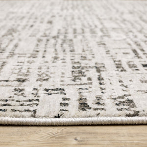 HomeRoots 2' Modern Abstract Power Loom Stain Resistant Runner Rug in Ivory, Grey, Charcoal, and Beige 7' X 10' 509544