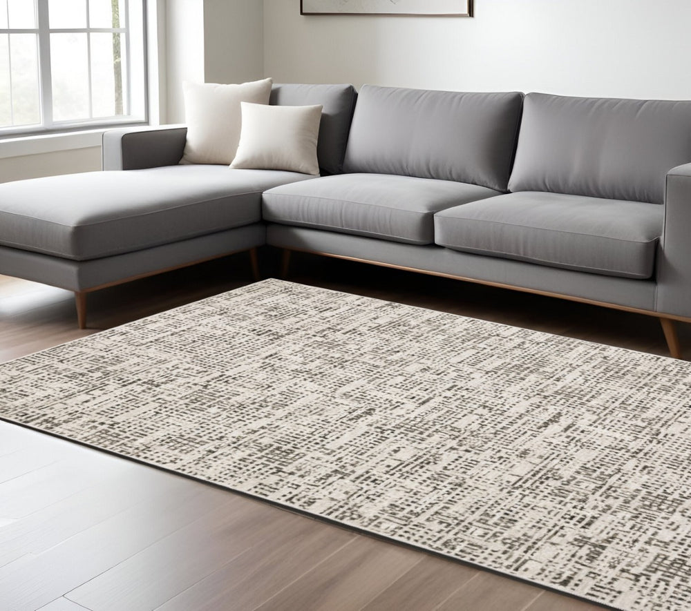 HomeRoots 2' Modern Abstract Power Loom Stain Resistant Runner Rug in Ivory, Grey, Charcoal, and Beige 8' X 11' 509545
