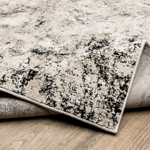 Homeroots 2' X 8' Ivory Grey Black Beige And Tan Abstract Power Loom Stain Resistant Runner Rug  Polyester 509553
