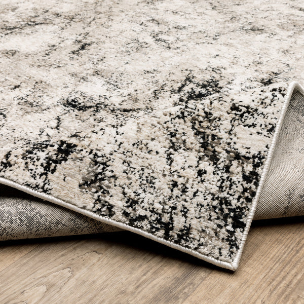 Homeroots 2' X 8' Ivory Grey Black Beige And Tan Abstract Power Loom Stain Resistant Runner Rug  Polyester 509553
