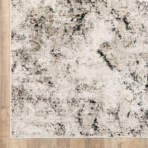 Homeroots 3' X 5' Ivory Grey Black Beige And Tan Abstract Power Loom Stain Resistant Area Rug  Polyester 509554