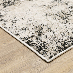 Homeroots 5' X 8' Ivory Grey Black Beige And Tan Abstract Power Loom Stain Resistant Area Rug  Polyester 509555