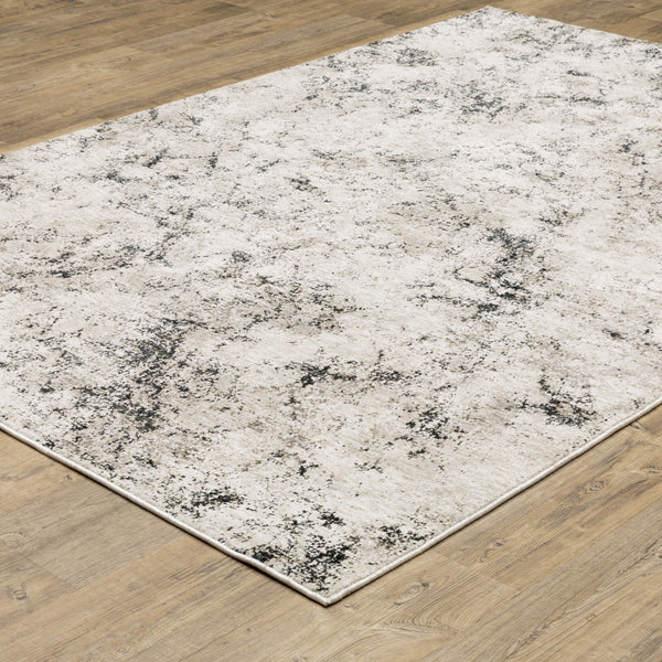 Homeroots 5' X 8' Ivory Grey Black Beige And Tan Abstract Power Loom Stain Resistant Area Rug  Polyester 509555