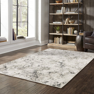 Homeroots 8' X 11' Ivory Grey Black Beige And Tan Abstract Power Loom Stain Resistant Area Rug  Polyester 509557