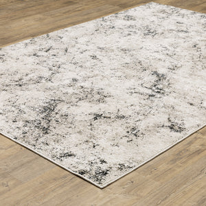 Homeroots 10' X 13' Ivory Grey Black Beige And Tan Abstract Power Loom Stain Resistant Area Rug  Polyester 509558