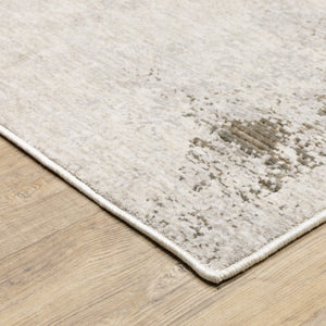 HomeRoots 2' Abstract Runner Rug in Beige, Ivory, Tan, Grey, and Brown - Stain Resistant for High-Traffic Areas 7' X 10' 509574