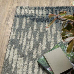 HomeRoots 10' Abstract Power Loom Area Rug in Grey, Beige, Blue & Light Blue - Stain Resistant & Stylish Decor 10' X 13' 509704