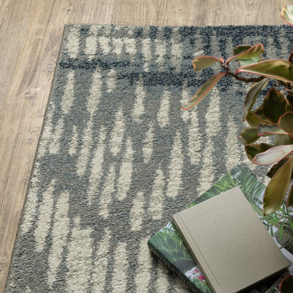 HomeRoots 10' Abstract Power Loom Area Rug in Grey, Beige, Blue & Light Blue - Stain Resistant & Stylish Decor 10' X 13' 509704