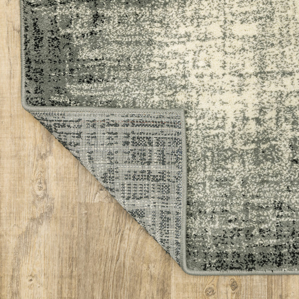 Homeroots 5' X 7' Grey Beige And Blue Power Loom Stain Resistant Area Rug  Polypropylene 509715