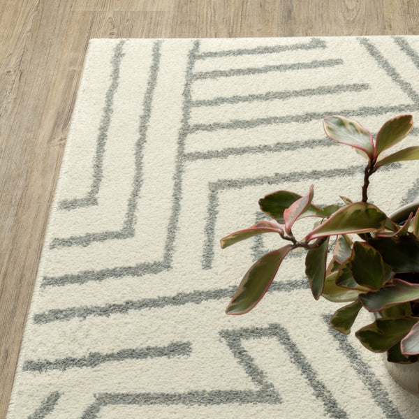 HomeRoots 10' Gray and Ivory Geometric Power Loom Area Rug for Modern Living Spaces - Durable and Stylish 10' X 13' 509746