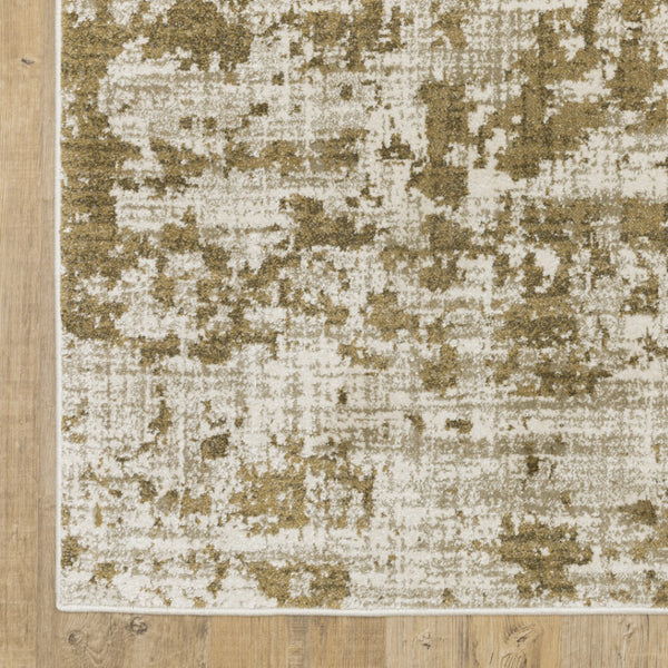 HomeRoots 2' Elegant Beige Gold and Grey Abstract Power Loom Runner Rug - Stain Resistant for High Traffic Areas 4' X 6' 509837