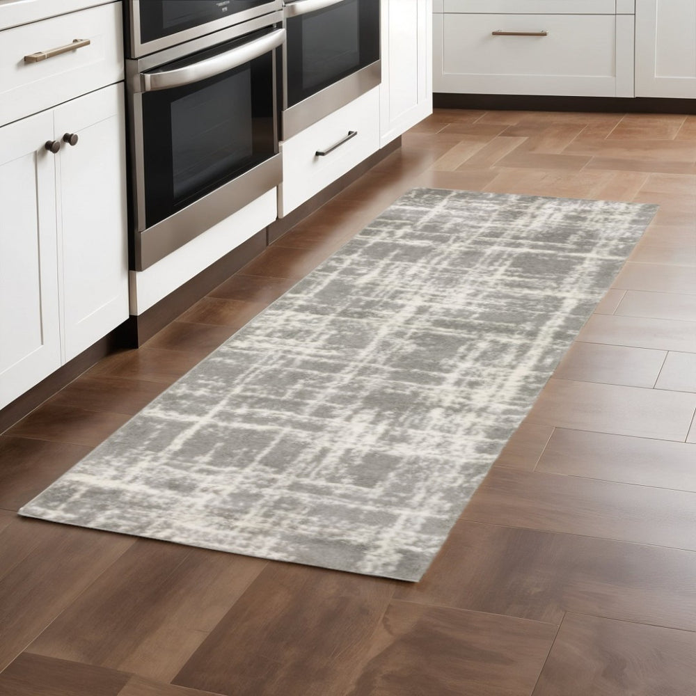 HomeRoots 2' Grey and Ivory Abstract Shag Runner Rug - Stylish, Stain-Resistant, Soft for High-Traffic Areas 2'3" x 7'6" 509878