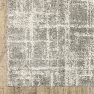 HomeRoots 2' Grey and Ivory Abstract Shag Runner Rug - Stylish, Stain-Resistant, Soft for High-Traffic Areas 7' X 10' 509882