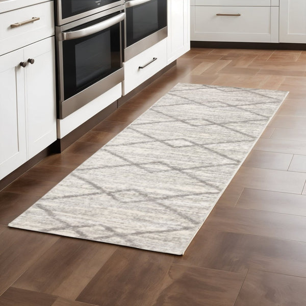 HomeRoots 2' X 8' Ivory and Grey Geometric Shag Runner Rug - Soft, Stain-Resistant Design for Modern Spaces 2'3" x 7'6" 509883