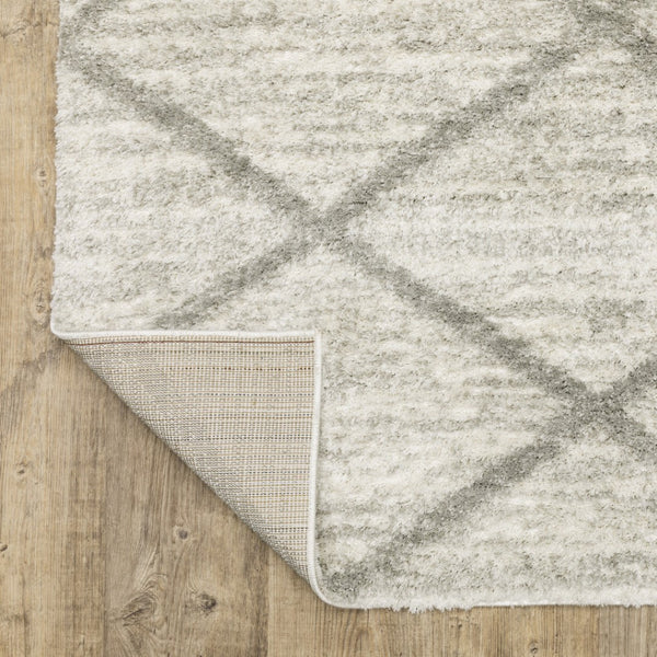 HomeRoots 2' X 8' Ivory and Grey Geometric Shag Runner Rug - Soft, Stain-Resistant Design for Modern Spaces 7' X 10' 509887