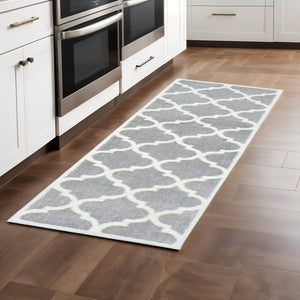 HomeRoots 2' Modern Geometric Shag Runner Rug - Stain-Resistant Floor Covering for High-Traffic Spaces Grey/ Ivory 2'3" x 7'6" 509898