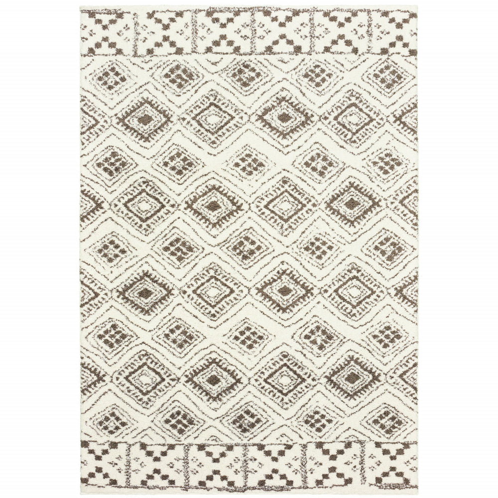 Homeroots 4' X 6' Ivory And Brown Geometric Shag Power Loom Stain Resistant Area Rug  Polyester 509907