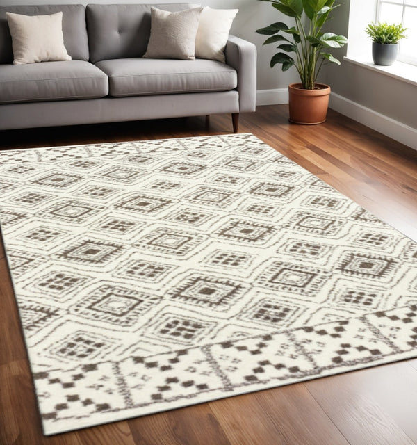 HomeRoots 2' Modern Ivory and Brown Geometric Shag Runner Rug - Soft, Stain-Resistant, Durable for High Traffic Areas 4' X 6' 509907
