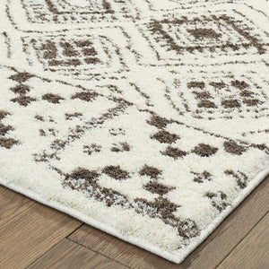 Homeroots 5' X 8' Ivory And Brown Geometric Shag Power Loom Stain Resistant Area Rug  Polyester 509908