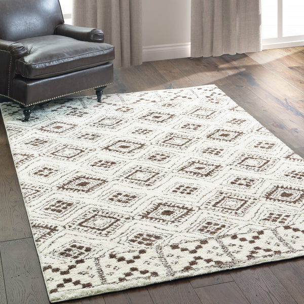 Homeroots 10' X 13' Ivory And Brown Geometric Shag Power Loom Stain Resistant Area Rug  Polyester 509911