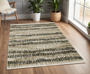 Homeroots 4' X 6' Beige Ivory Charcoal Brown Tan And Grey Abstract Power Loom Stain Resistant Area Rug With Fringe  Recycled Pet 510280