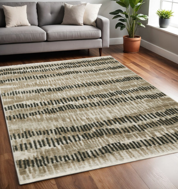 HomeRoots 2' Contemporary Abstract Runner Rug in Beige, Ivory, Charcoal and Grey with Stain Resistance and Fringe 5' X 8' 510281