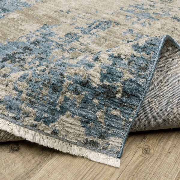 HomeRoots 2' Abstract Power Loom Runner Rug in Blue and Ivory with Stain Resistance and Tassel Fringe Design 2'3" x 7'6" 510291