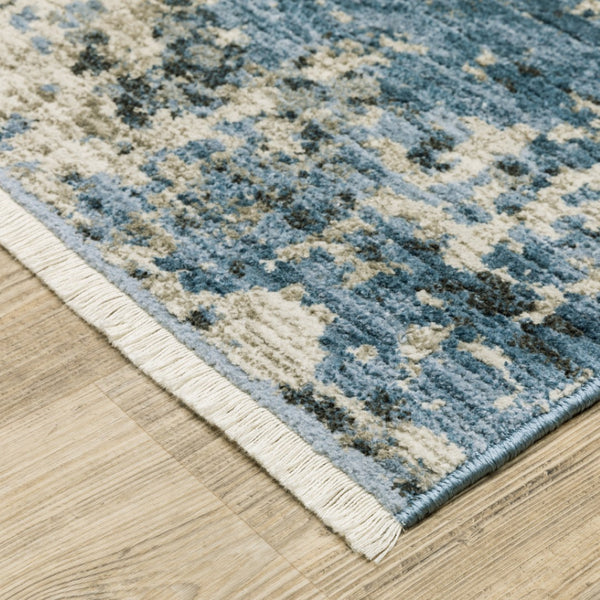 HomeRoots 2' Abstract Power Loom Runner Rug in Blue and Ivory with Stain Resistance and Tassel Fringe Design 5' X 8' 510293