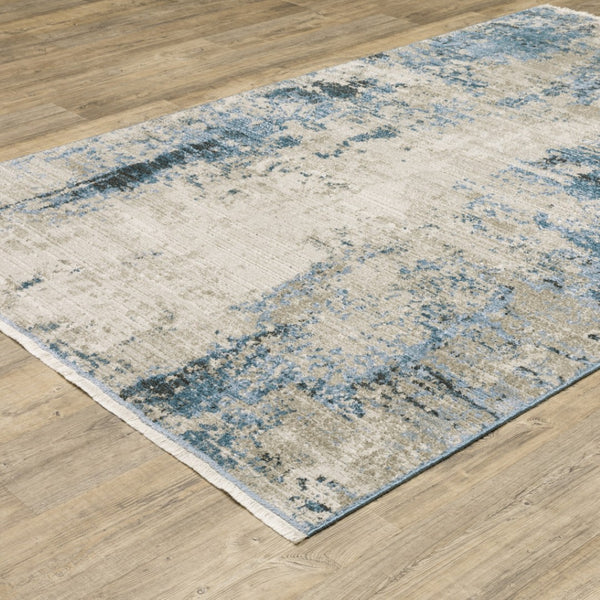 HomeRoots 2' Abstract Power Loom Runner Rug in Blue and Ivory with Stain Resistance and Tassel Fringe Design 10' X 13' 510296