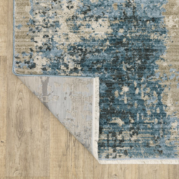 HomeRoots 2' Abstract Power Loom Runner Rug in Blue and Ivory with Stain Resistance and Tassel Fringe Design 10' X 13' 510296