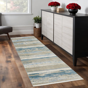 HomeRoots 8' Blue and Beige Abstract Distressed Runner Rug with Eco-Friendly Fibers and Fringe Tassels 2'3" x 7'6" 510297