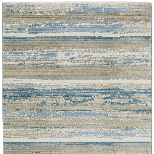 HomeRoots 8' Blue and Beige Abstract Distressed Runner Rug with Eco-Friendly Fibers and Fringe Tassels 2'3" x 7'6" 510297