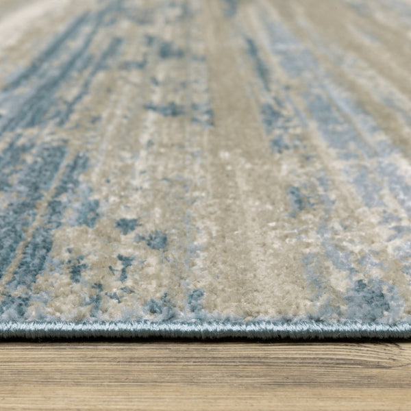 HomeRoots 8' Blue and Beige Abstract Distressed Runner Rug with Eco-Friendly Fibers and Fringe Tassels 2'3" x 7'6" 510297