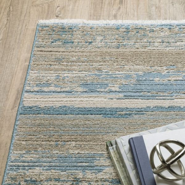 HomeRoots 8' Blue and Beige Abstract Distressed Runner Rug with Eco-Friendly Fibers and Fringe Tassels 4' X 6' 510298