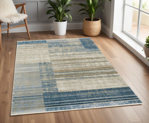 Homeroots 4' X 6' Blue Dark Blue Teal Grey Ivory Beige And Tan Geometric Power Loom Stain Resistant Area Rug With Fringe Blue,Beige Recycled Pet 510304