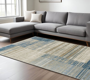 Homeroots 8' X 11' Blue Dark Blue Teal Grey Ivory Beige And Tan Geometric Power Loom Stain Resistant Area Rug With Fringe Blue,Beige Recycled Pet 510307