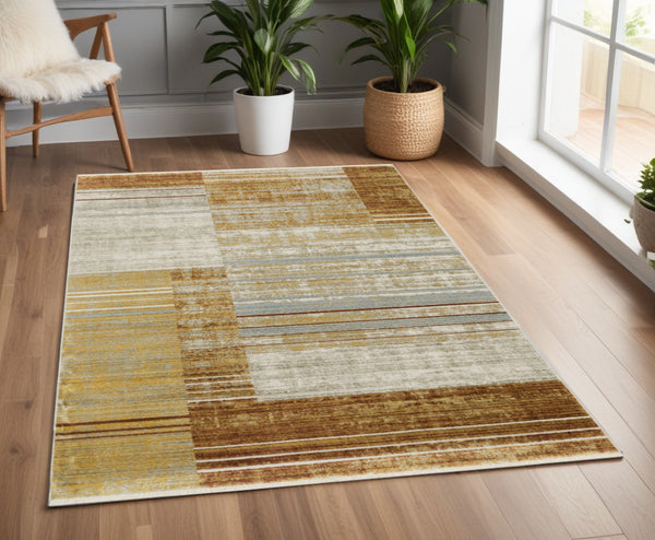 Homeroots 4' X 6' Rust Gold Blue Grey Ivory And Tan Geometric Power Loom Stain Resistant Area Rug With Fringe Rust,Gold Recycled Pet 510316