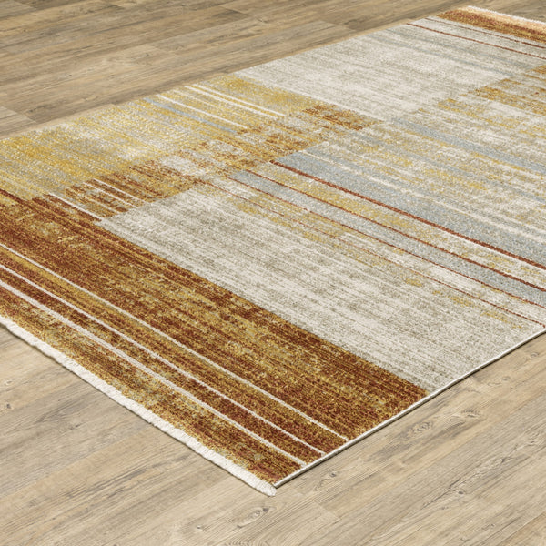 Homeroots 5' X 8' Rust Gold Blue Grey Ivory And Tan Geometric Power Loom Stain Resistant Area Rug With Fringe Rust,Gold Other Material 510317