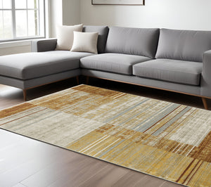 Homeroots 6' X 9' Rust Gold Blue Grey Ivory And Tan Geometric Power Loom Stain Resistant Area Rug With Fringe Rust,Gold Recycled Pet 510318