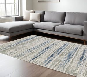 HomeRoots 2' Abstract Power Loom Runner Rug in Grey Blue, Light Blue, Ivory & Brown - Stain Resistant Style 8' X 11' 510417