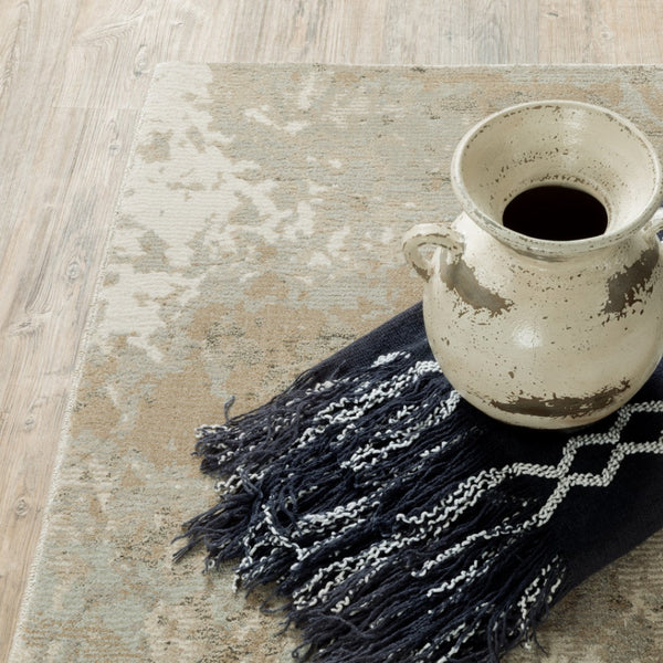 HomeRoots 10' Gray and Ivory Abstract Area Rug - Stylish Power Loomed Design for Modern Homes and Durability 7' X 10' 510434