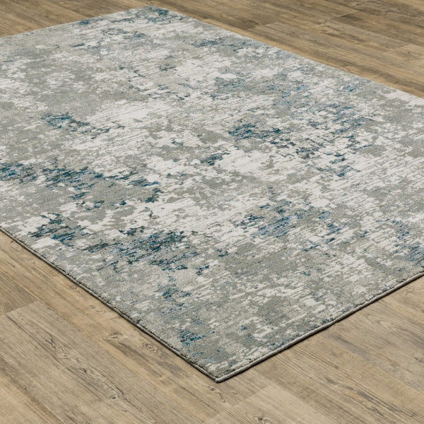 HomeRoots 10' Blue and Beige Abstract Area Rug - Durable, Stain-Resistant Design for Modern Living Spaces 5' X 7' 510487