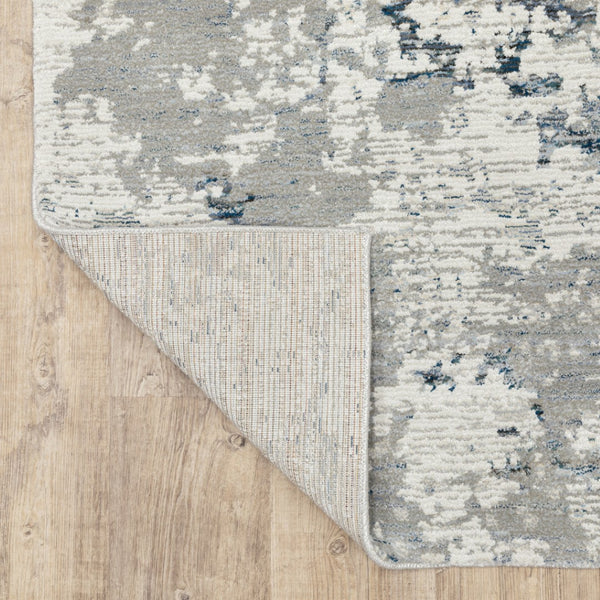 HomeRoots 10' Blue and Beige Abstract Area Rug - Durable, Stain-Resistant Design for Modern Living Spaces 7' X 10' 510488