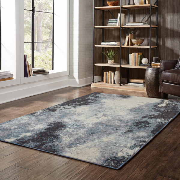 HomeRoots 10' Abstract Blue and Ivory Area Rug – Contemporary Power Loom Design for Modern Living Spaces 3' x 5' 510495